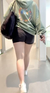 3 girls in black shorts