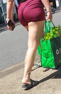 PAWG in incredible lighting and tiny tight shorts. Visible thong line and feet. Thick thighs and calf tatts. (OC)