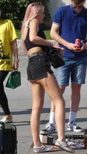 Tall blonde and pink haired girl showing her ass cheeks