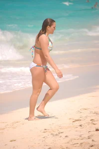 Bunch of sexy girls and milfs in bikinis at the beach