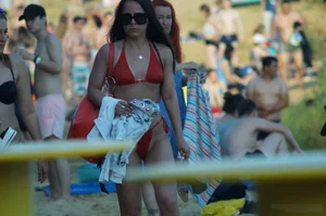 Amazing Girl in Red Swimsuit and Sunglasses with Small Breast Walking on the Beach Hot Creepshots