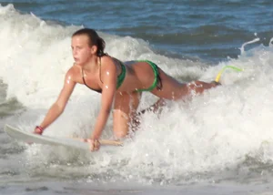 Hot surfer chicks out in the water