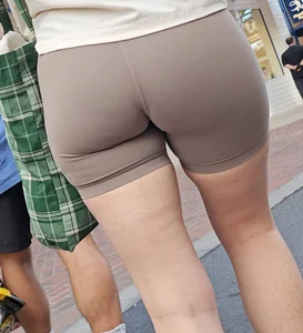 Booty in light brown biker shorts