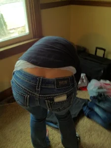 Milf in Tight Jeans Bending Over at Home Creepshot