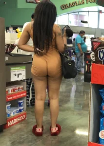 Latina with hard nipples and a big booty in tight spandex shorts outfit