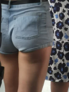 Cute girl on Bus in hotpants