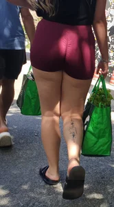 PAWG in incredible lighting and tiny tight shorts. Visible thong line and feet. Thick thighs and calf tatts. (OC)