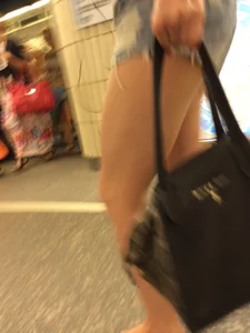 Girl with Hot Muscular Legs in Shorts - Subway Creephot