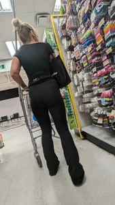 Beautiful tight blonde in black legging at dollar strore. oc