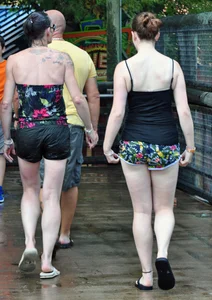 Couple of cute girls in wet shorts with decent asses