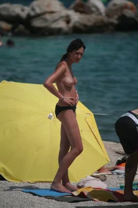 3 amazing topless girls on a nudist beach