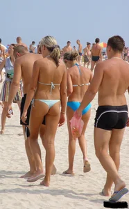 Beach voyeur girls in bikinis, thongs and topless