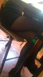 Girl Sitting with Legs Crossed in Classroom - Under Desk Candid