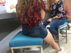 Girl in Denim Shorts Sitting on a Stool With Spread Legs Food Court Creepshots