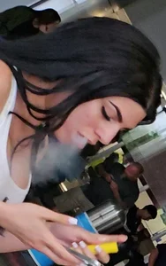Megapost: Beautiful M.E in ALL white outfit vaping. (GIF)