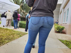 Ebony in jeans  in the voting line
