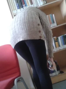 Candid Girl in a Grey Sweater And Leggings Bending Over at the Library, Creepshots Gallery