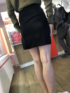 Girl with Pale Skinny Legs in a Skirt Candid