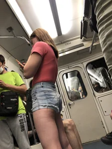 Gorgeous Legs And Butt in Denim Shorts And Feet in Sandals - Creepshots Gallery in a Subway Train and on an Escalator