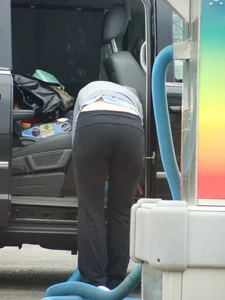 Girls cleaning their cars in jeans and pants
