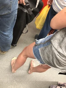 Girl in Denim Mini Shorts and Sandals With Sexy Legs And Feet Street and Subway Photos