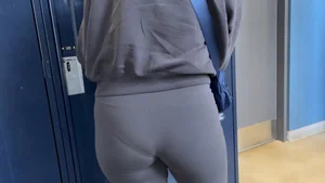 College Vpl Latina In Dark Grey Leggings Going Up The Stairs