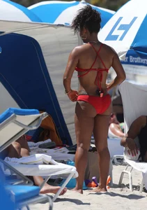 Christina Milian in red bikini in Miami with hard nipples