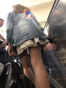 Hot Thin Legs in a Skirt on the Subway Escalator Creepshots