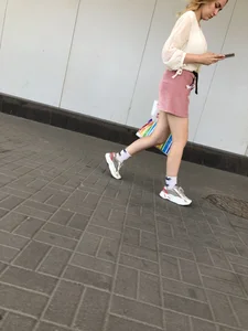 Cute street candid girl in a skirt
