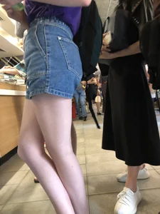 Hot Bare Legs in Blue Denim Shorts Closeup Candid Pics Gallery in the Cafe Line