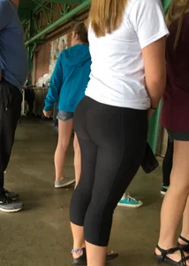 Big booty babe at a baseball game in tight leggings