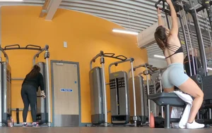Gym brunette in tight grey shorts