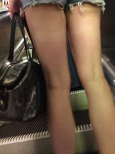 Girl with Hot Muscular Legs in Shorts - Subway Creephot