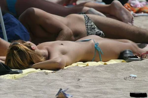 Beach voyeur babes in bikinis, thongs and topless