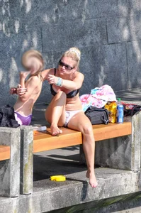 Blonde milf looking sexy in Hello Kitty bikini with nice mound and camel toe
