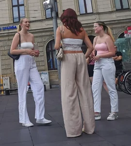 Long blonde braless in a white outfit (many pictures)