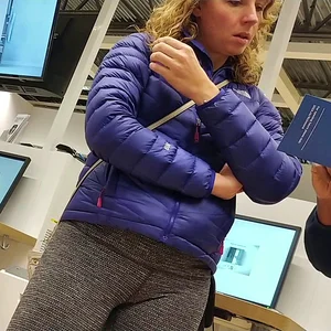 Blonde lady shopping in tight dark grey leggings