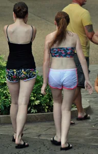 Couple of cute girls in wet shorts with decent asses