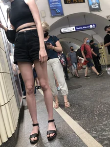 Amazing Hot Skinny Candid Girl in Shorts And Sandals Touching Her Leg on a Subway Station Creepshots Gallery