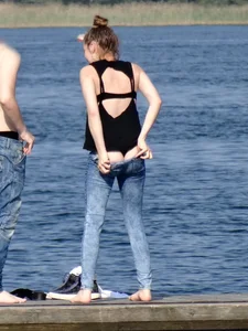 Girl on the water in black thong bikini with a nice ass