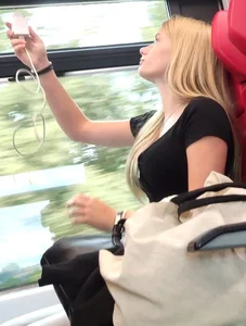 Hot busty blonde on train