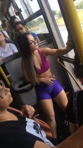 Girl with Muscular Legs in Spandex Shorts and Top Bus Creepshot