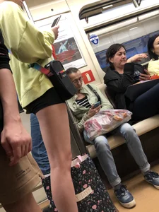 Hot subway candid girl in shorts with hot slim legs closeups
