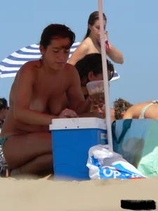 2 topless thonged sexy friends on the beach with great bodies
