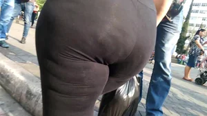 Candid girl with a huge booty in tight leggings