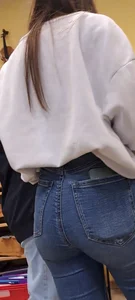 Girl is showing her blue jeans
