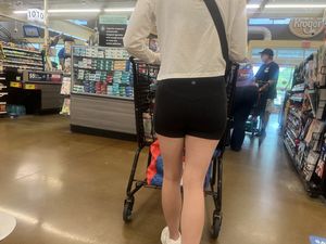 Hand print on tight ass Brunette (Biker shorts)