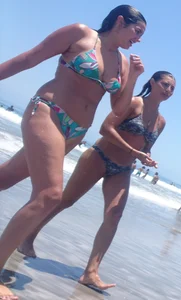 Thick and skinny sexy friends on the beach in bikinis