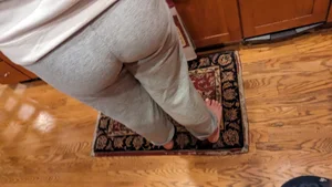Home booty closeup in grey sweatpants creepshot