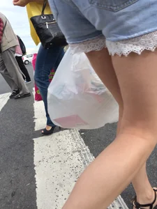 Legs in Denim Shorts - Candid Girl Passing By on a Crosswalk